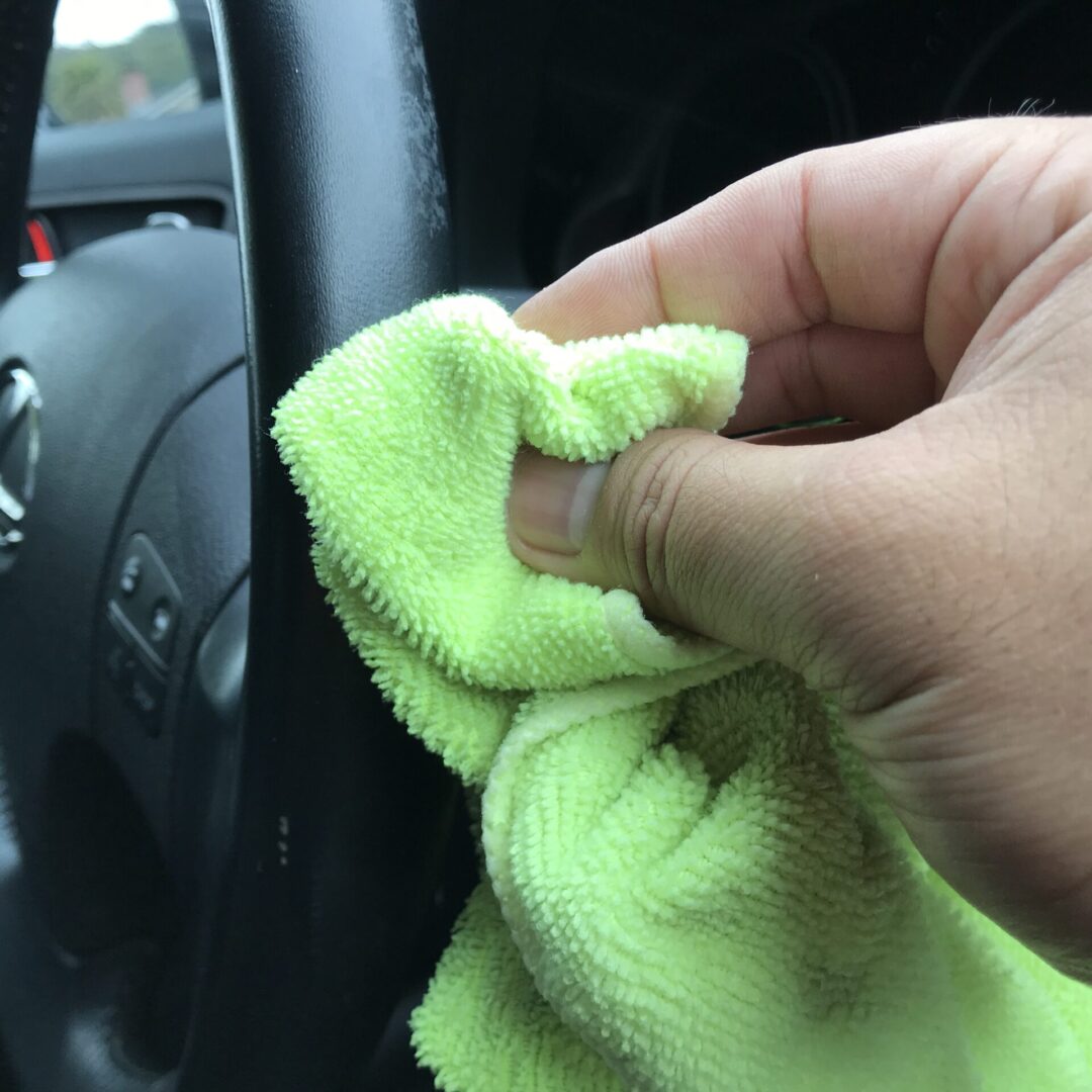 cleaning steering wheel during interior detail