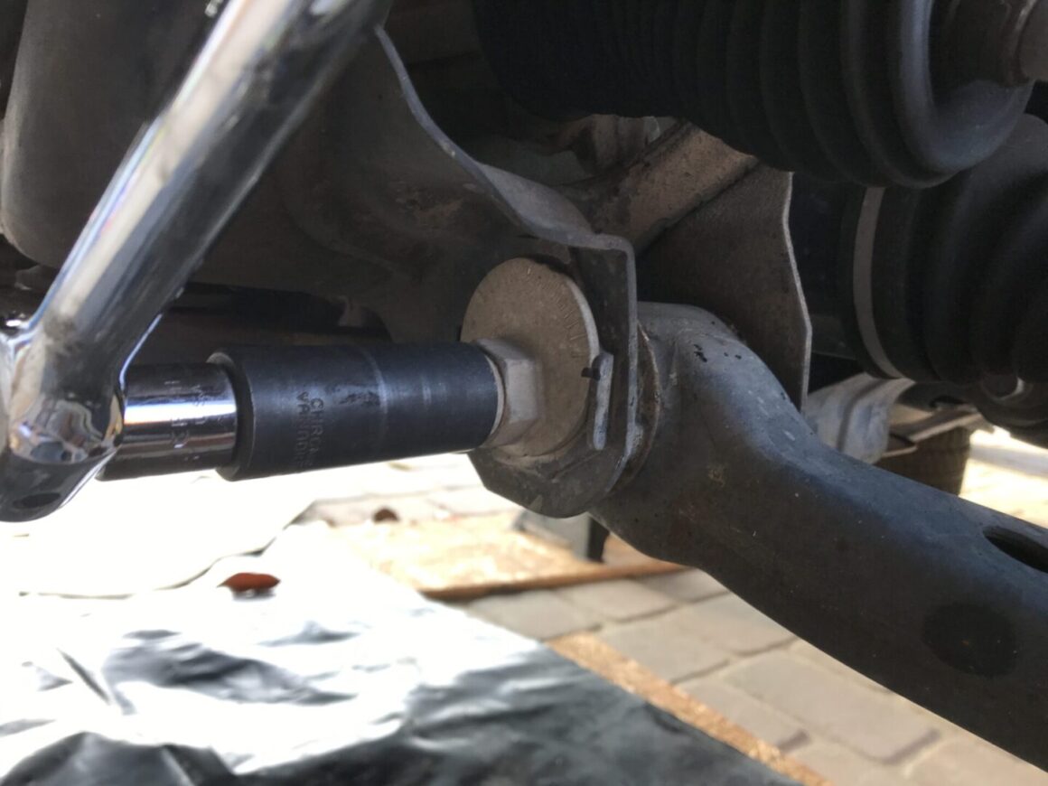 4th gen 4runner how to replace front shocks and coil springs - retightening alignment cams