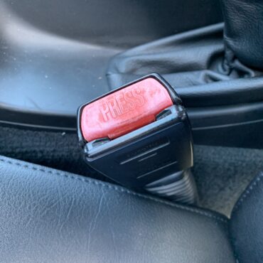How to Restore Faded Red Seatbelt Buttons